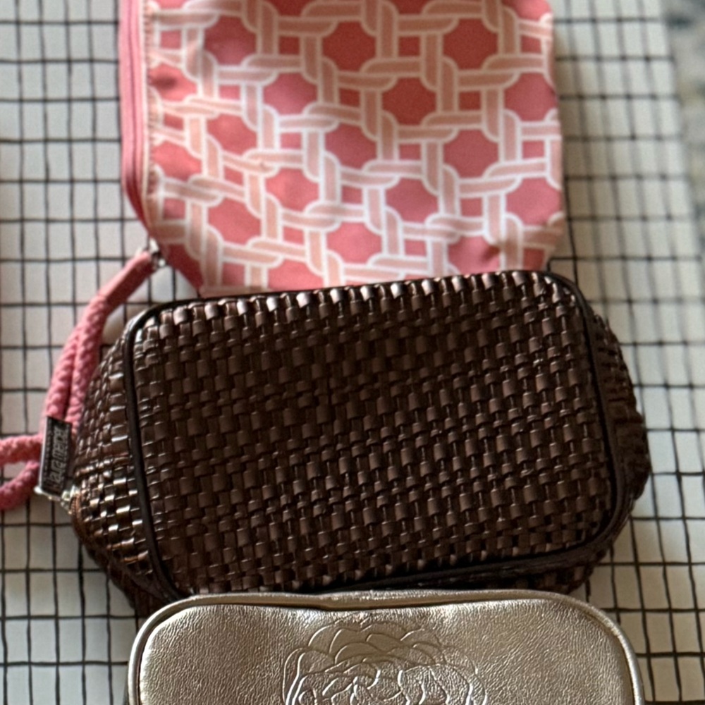 Laura Mercier NWT woven leather cosmetic bag